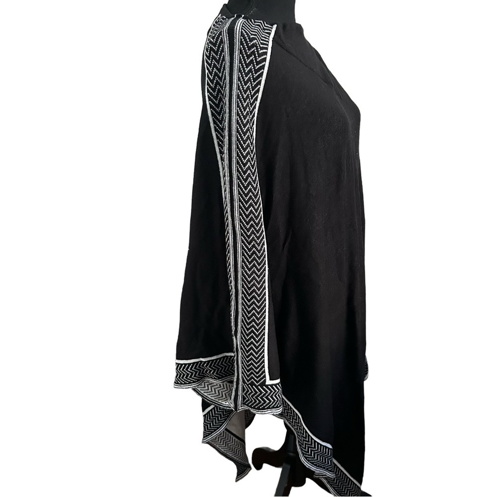 Chic Black and White Knit Poncho by Mille Collins